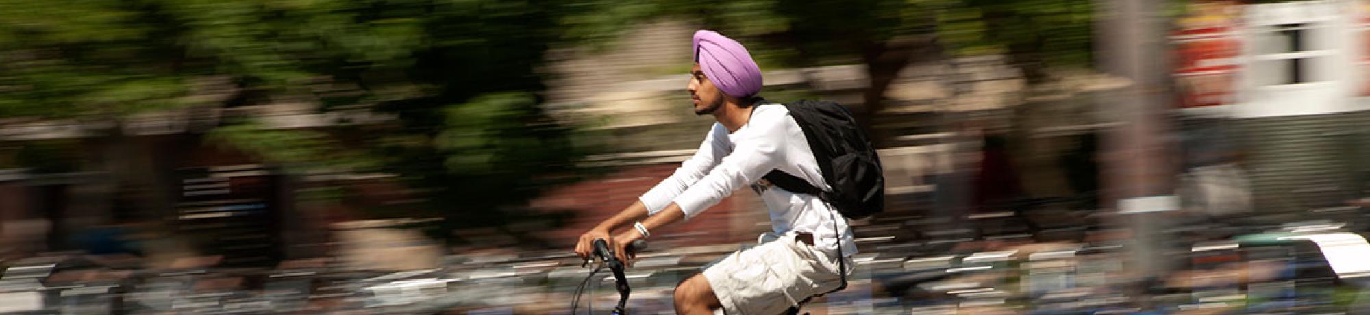 Man Riding Bicycle